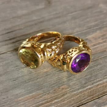 Ring rund facettierter Stein Gold